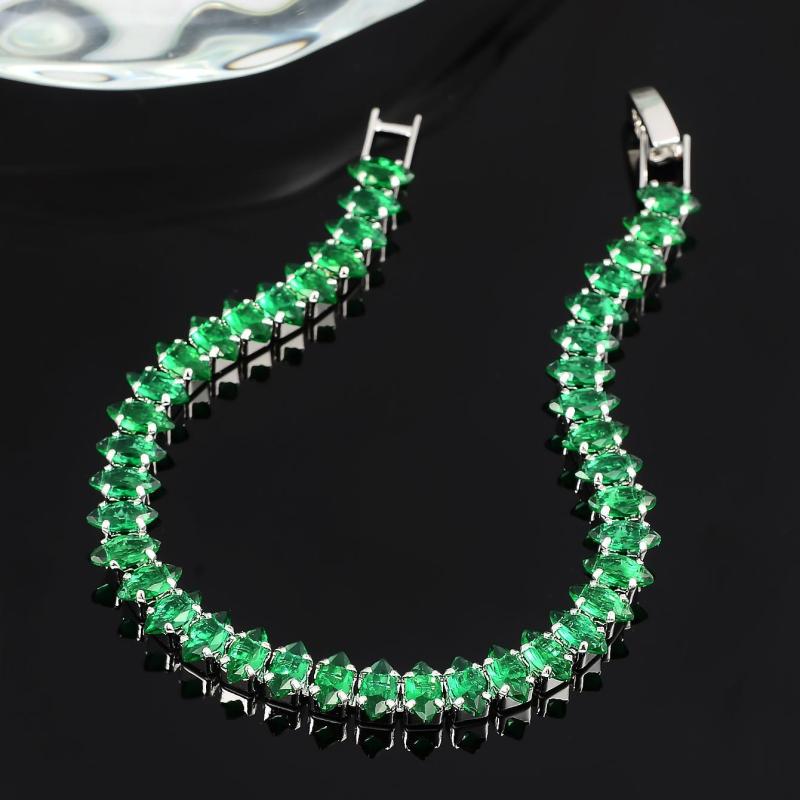 Bracelet avec des pierres d'émeraude en or