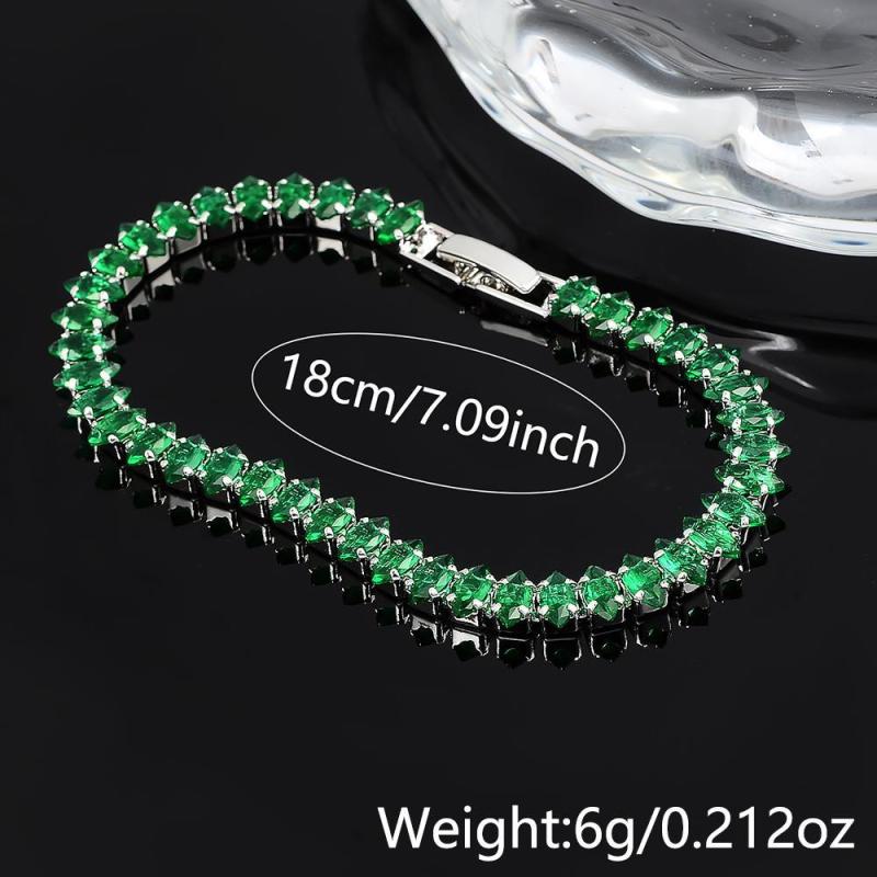 Bracelet avec des pierres d'émeraude en or