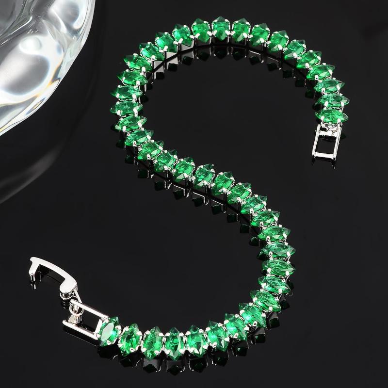 Bracelet avec des pierres d'émeraude en or
