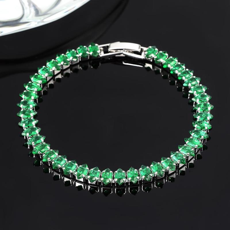 Bracelet avec des pierres d'émeraude en or