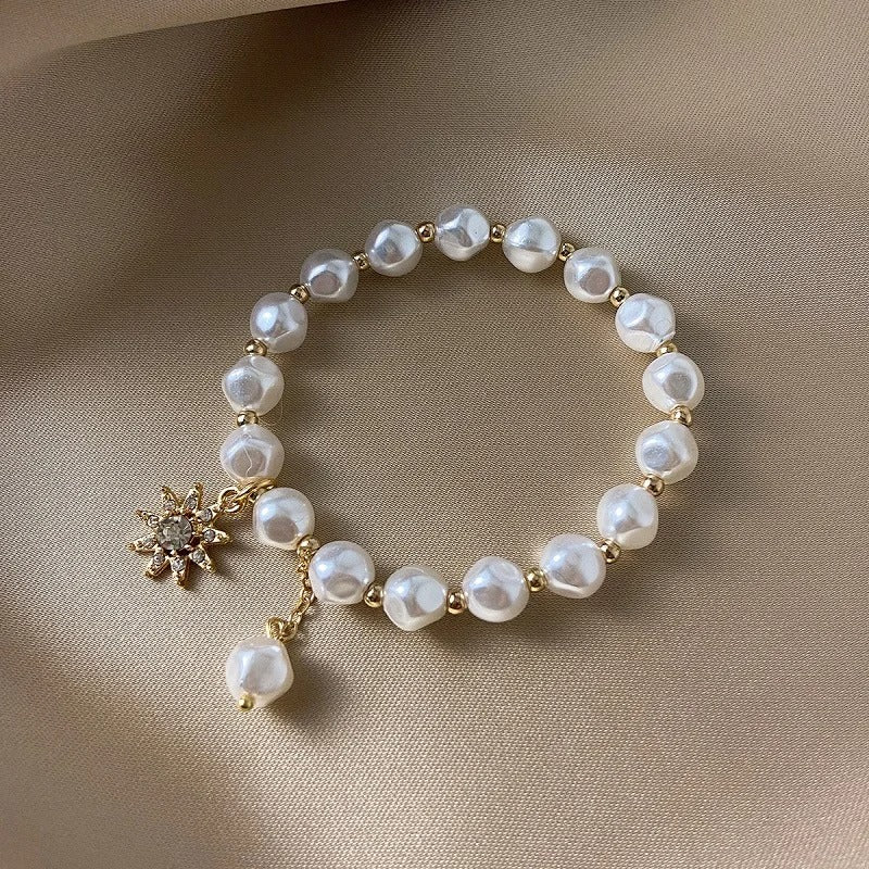 Bracelet avec médaillon, marguerite et tournesol en or blanc