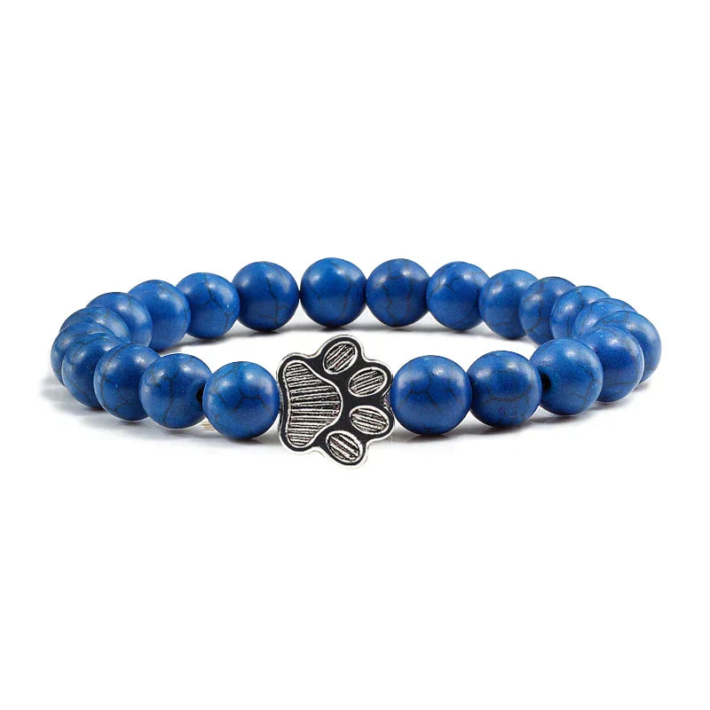 Bracelet avec perles en forme de pattes, motif en pierre naturelle en or