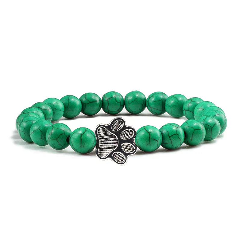 Bracelet avec perles en forme de pattes, motif en pierre naturelle en or