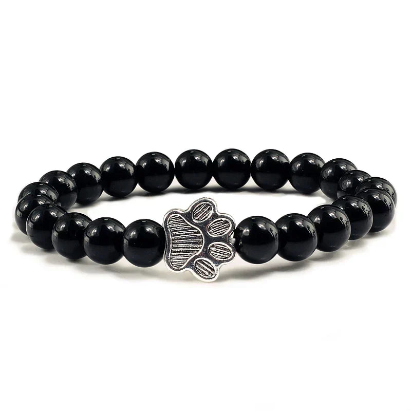 Bracelet avec perles en forme de pattes, motif en pierre naturelle en or