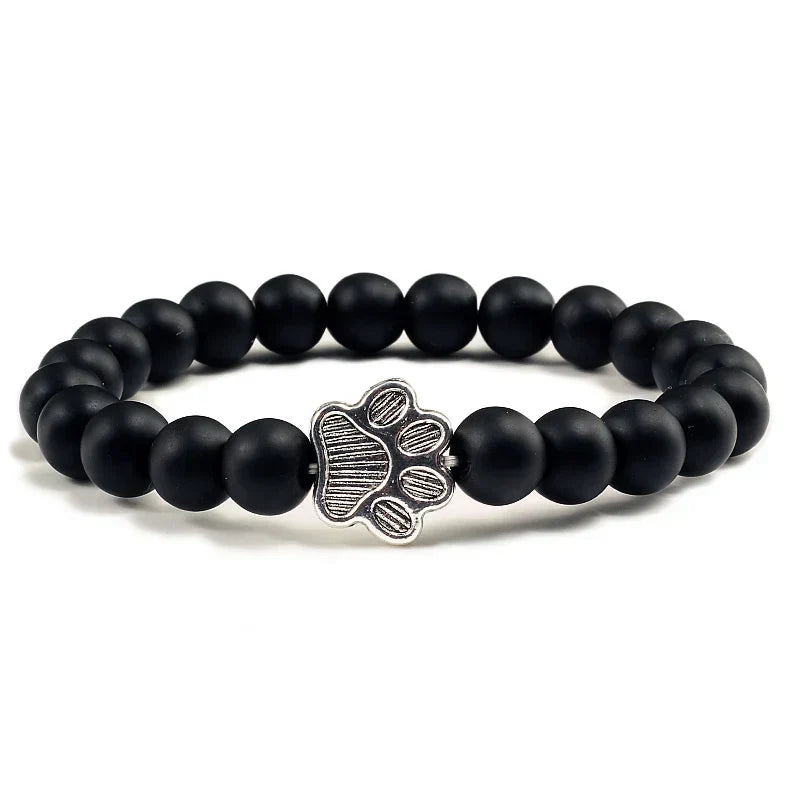 Bracelet avec perles en forme de pattes, motif en pierre naturelle en or