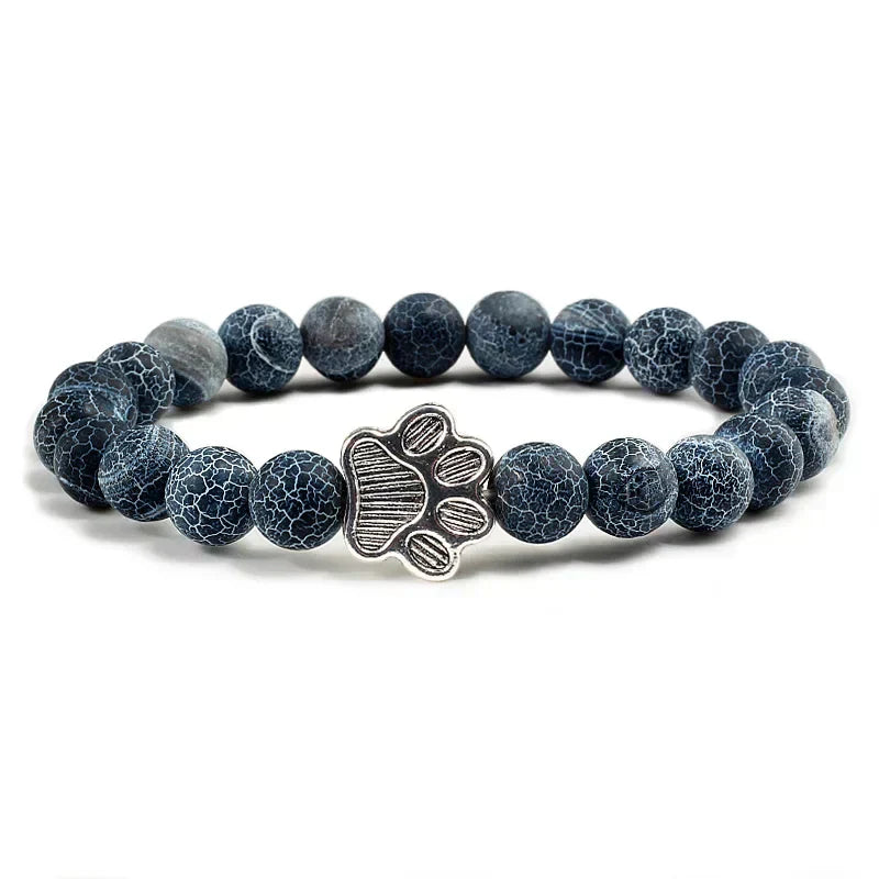 Bracelet avec perles en forme de pattes, motif en pierre naturelle en or