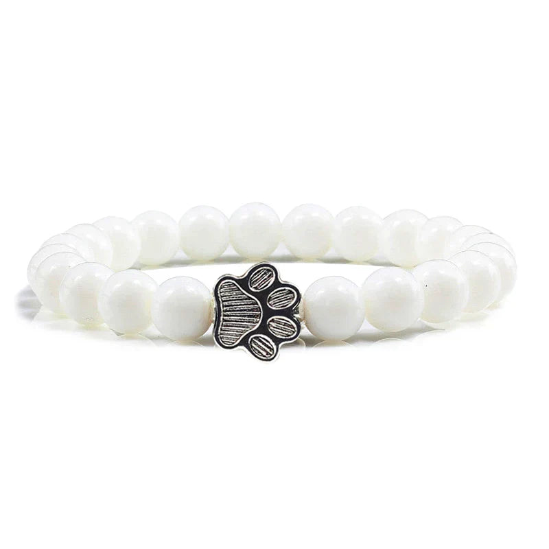 Bracelet avec perles en forme de pattes, motif en pierre naturelle en or