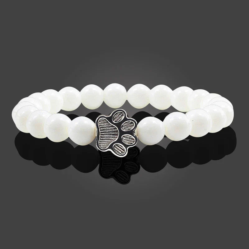 Bracelet avec perles en forme de pattes, motif en pierre naturelle en or