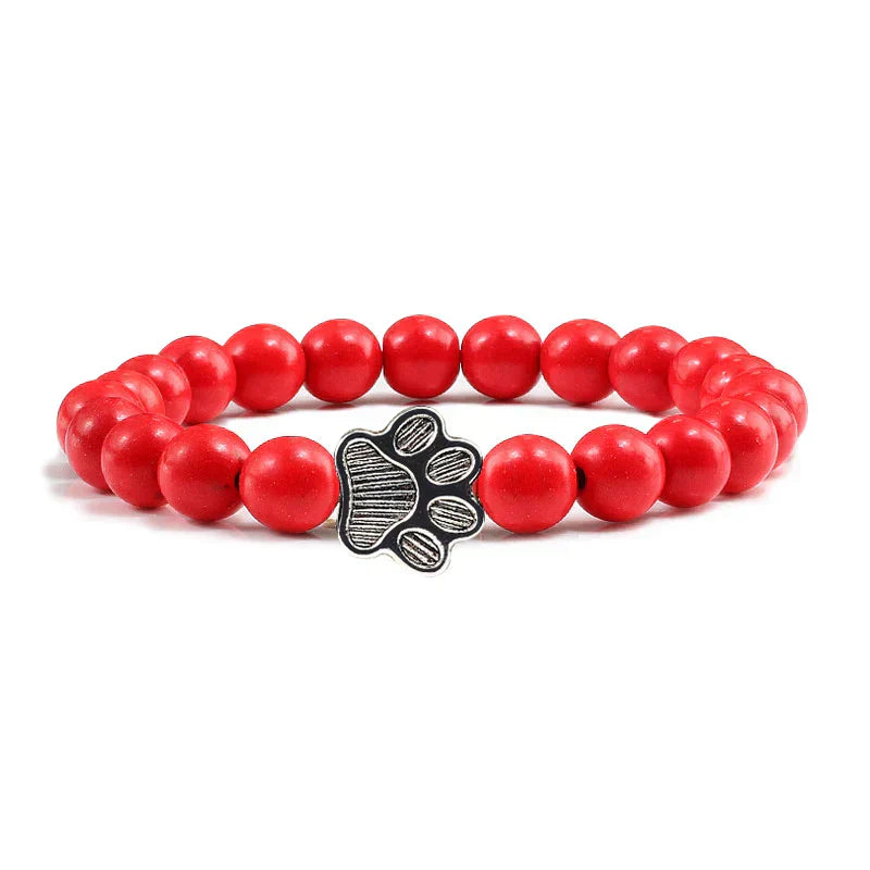 Bracelet avec perles en forme de pattes, motif en pierre naturelle en or