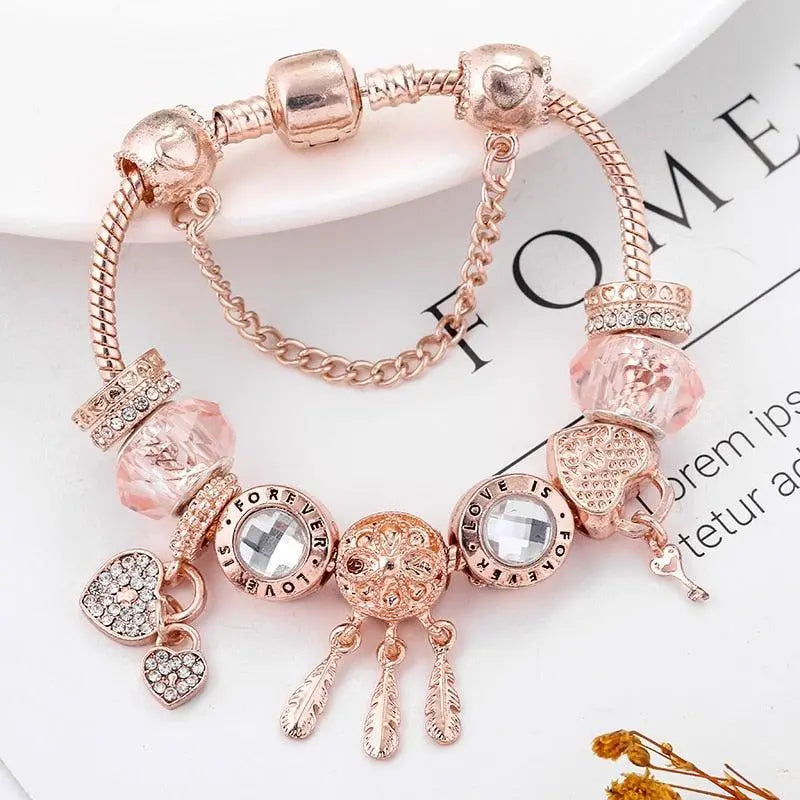 Bracelet capteur de rêves rose avec pendentifs en or blanc