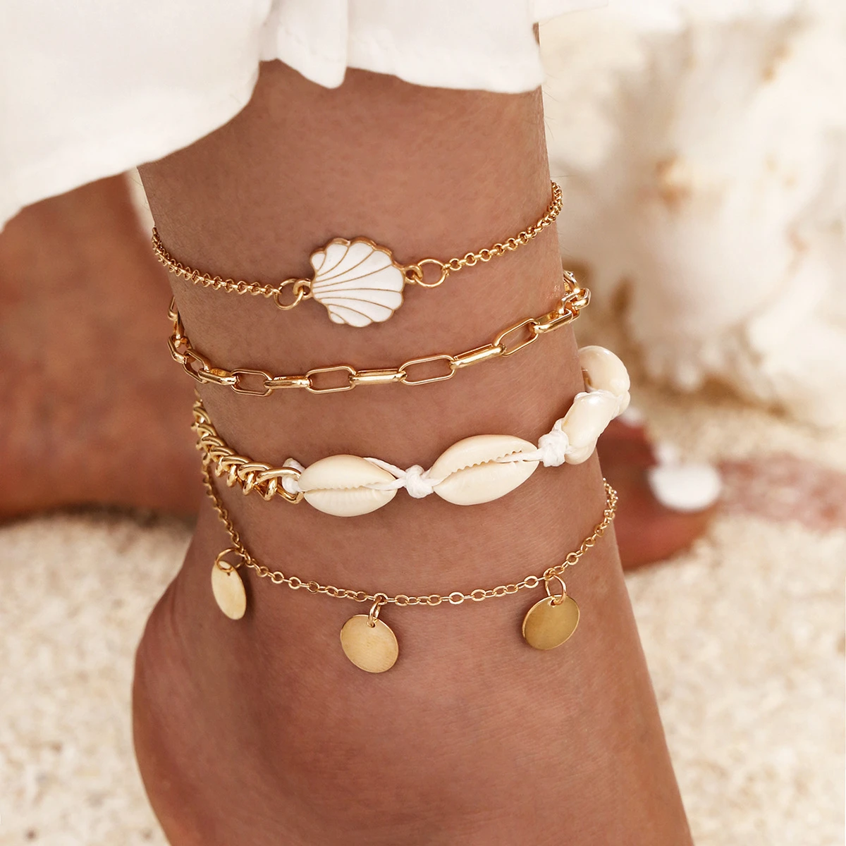 Bracelet de cheville avec des coquillages en or