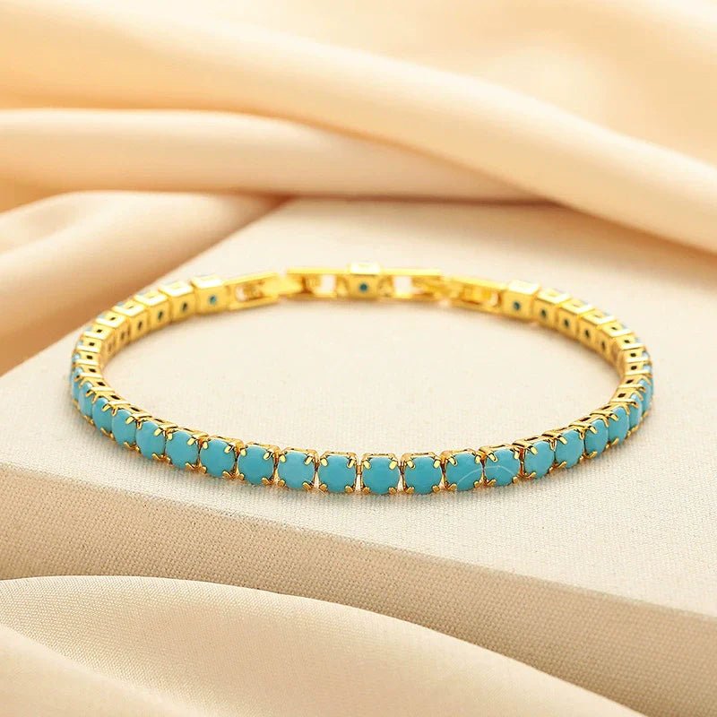 Bracelet de tennis rond turquoise en or
