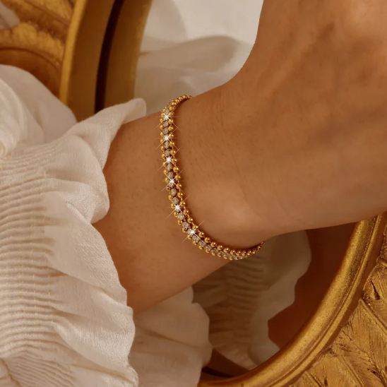 Bracelet en acier inoxydable avec chaîne de brillants en or