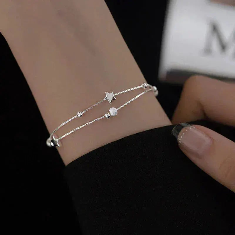 Bracelet avec étoiles en or blanc