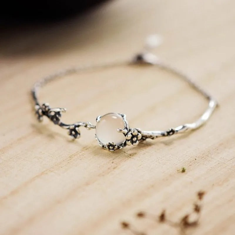 Bracelet rétro avec branche de fleur en or blanc