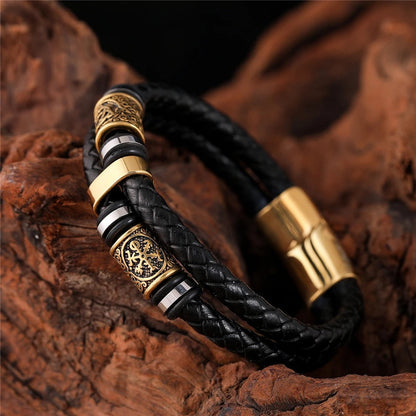 Bracelet en cuir noir tressé avec pendentif en or