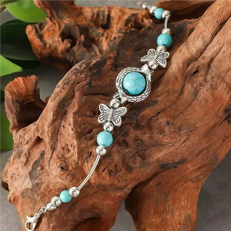 Bracelet avec des papillons en or blanc