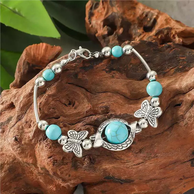 Bracelet avec des papillons en or blanc