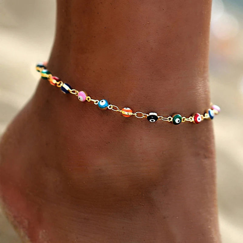 Bracelet coloré avec l'œil grec en or