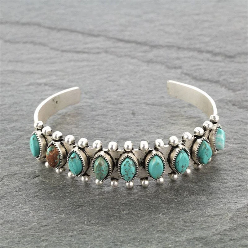 Bracelet rétro avec pierres turquoises en or