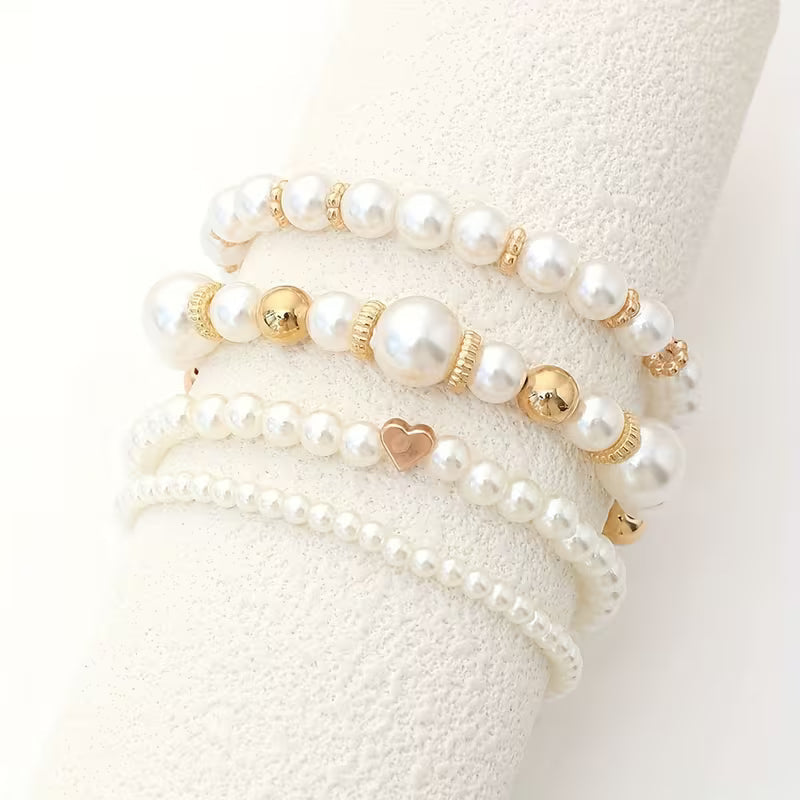 Bracelets en perles blanches en or