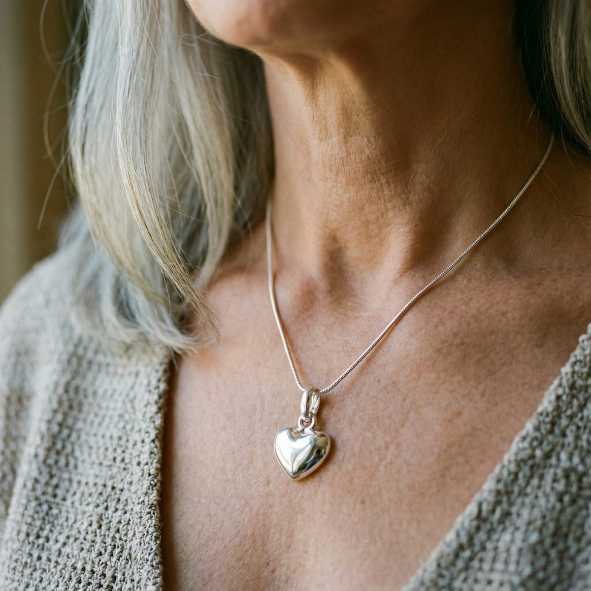 Collier cœur en or blanc