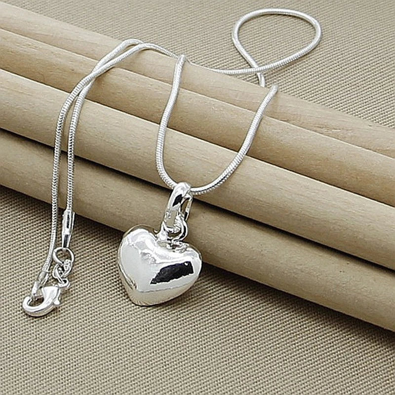 Collier cœur en or blanc