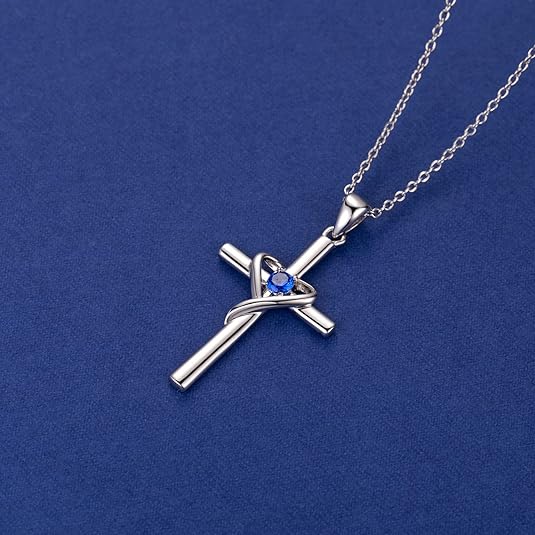 Collier croix saphir en or blanc