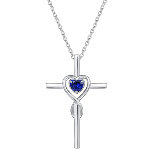 Collier croix en pierre de cœur saphir en or blanc