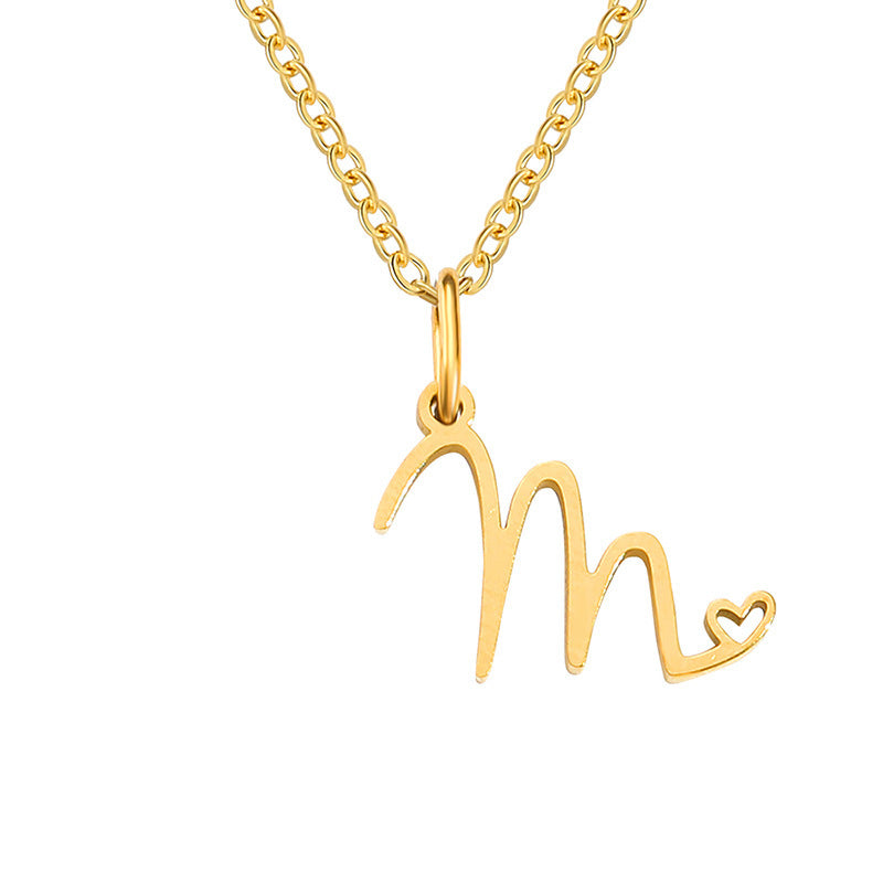 Collier initial coeur en or