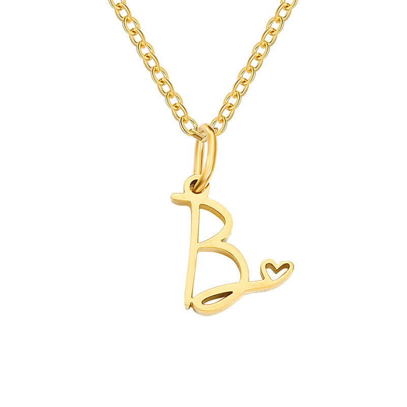 Collier initial coeur en or
