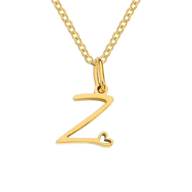 Collier initial coeur en or