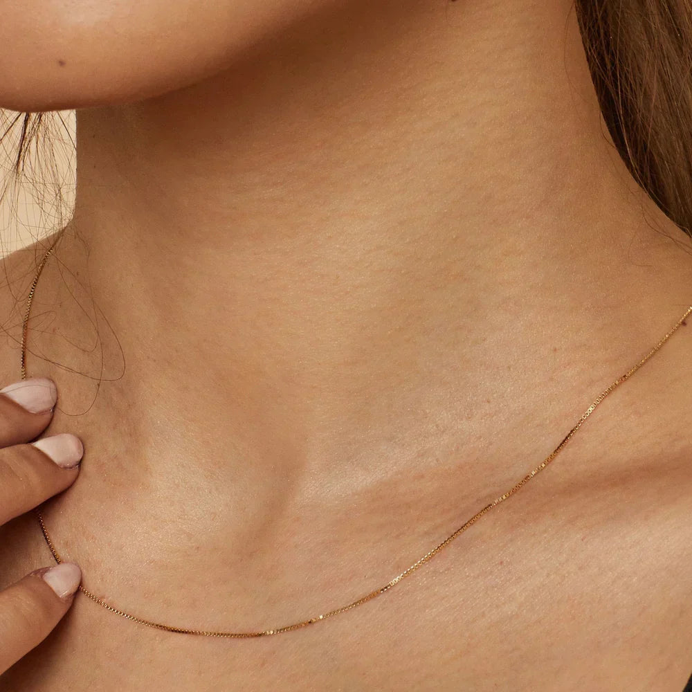 Collier maillon cubain en or blanc