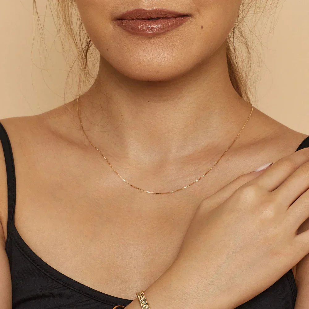 Collier maillon cubain en or blanc