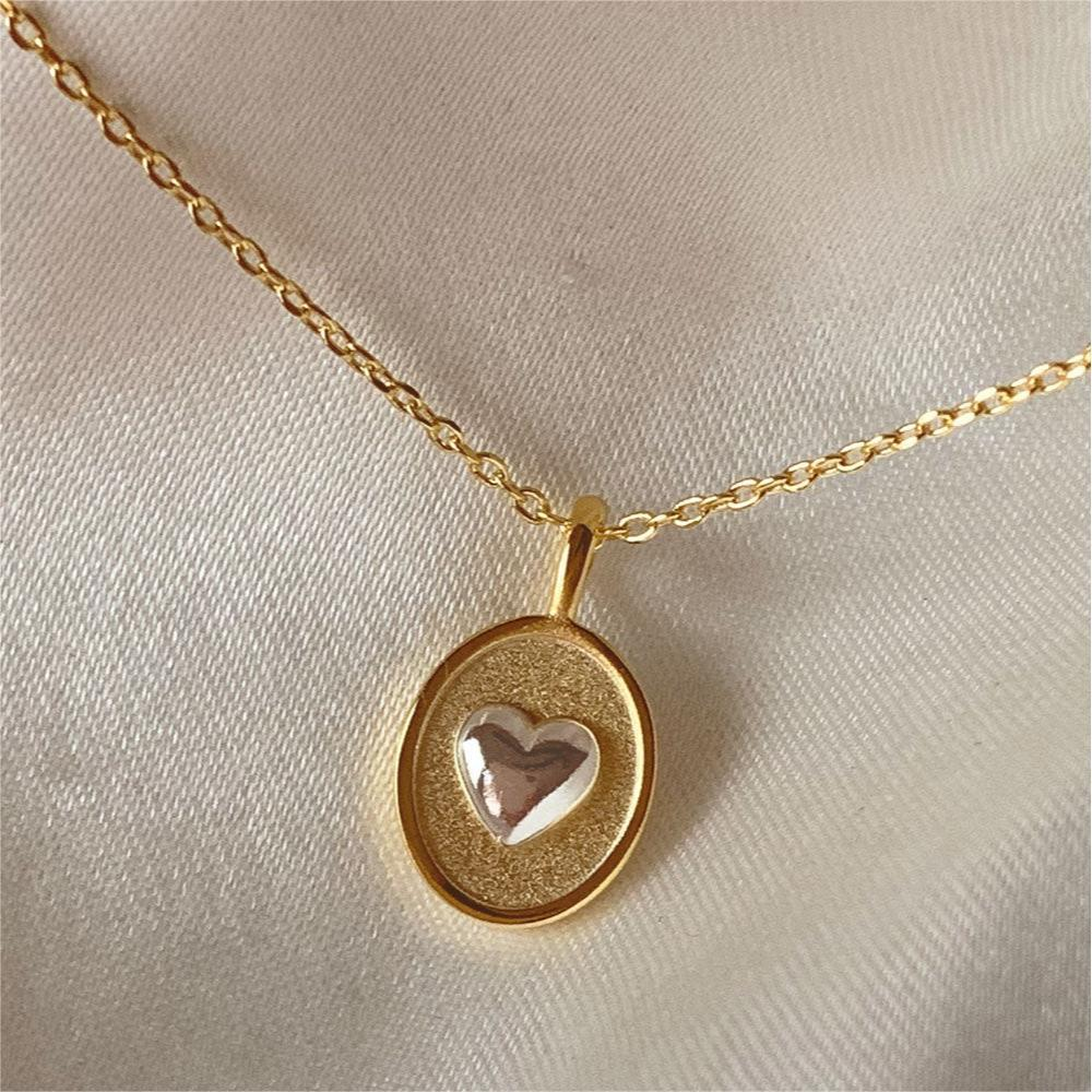 Collier rétro cœur en or