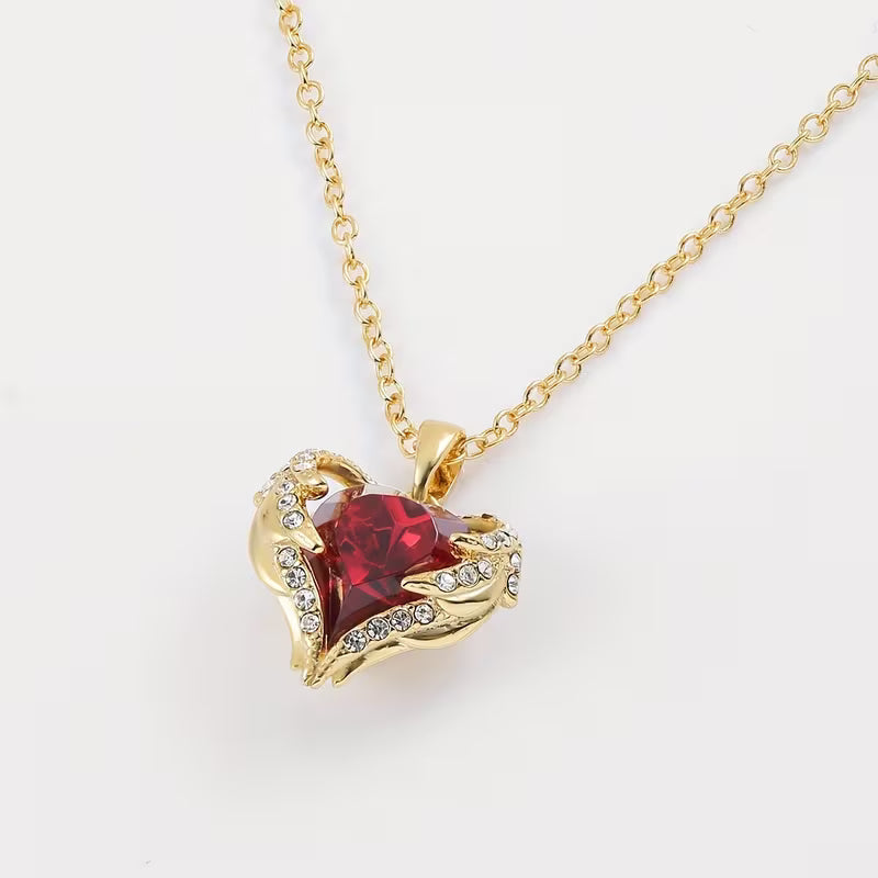 Collier avec cœur en rubis ange en or