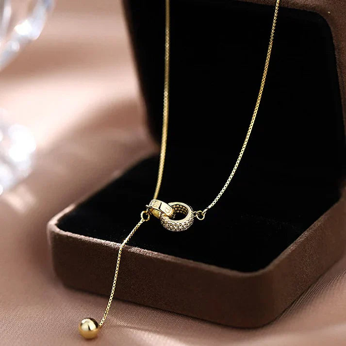 Collier avec deux anneaux en or