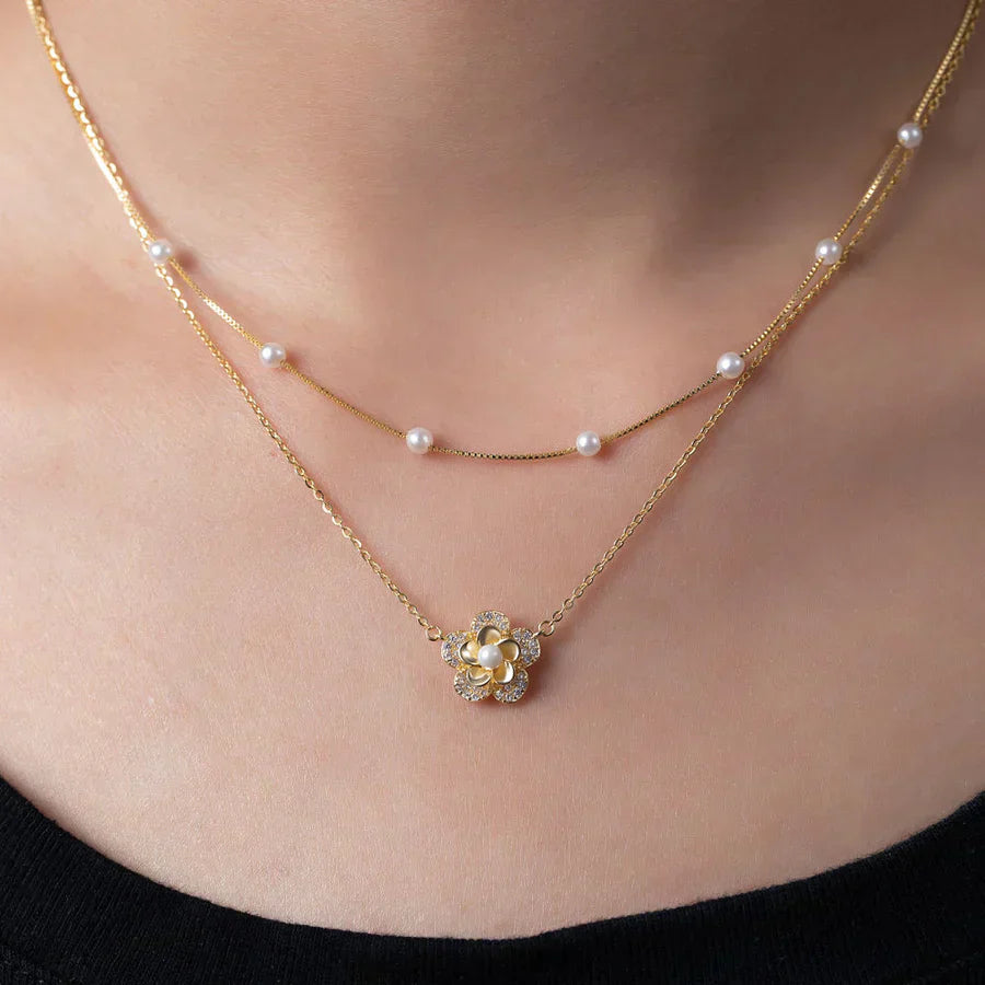 Collier de fleurs avec perles doubles en or