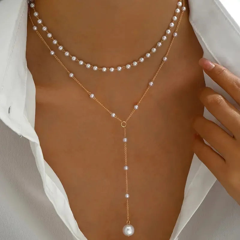 Collier de perles à deux rangs avec pendentifs en or