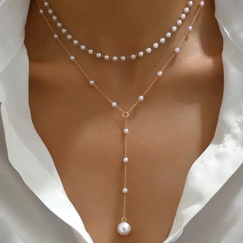 Collier de perles à deux rangs avec pendentifs en or