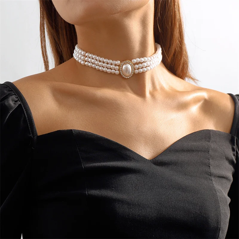 Collier élégant avec trois perles en or