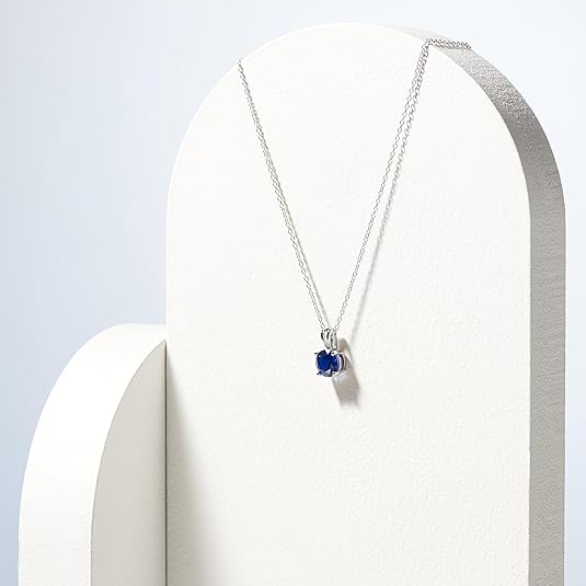 Collier en saphir Taillé rond en or blanc