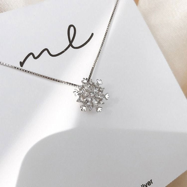 Collier en cristal avec neige brillante en or rose