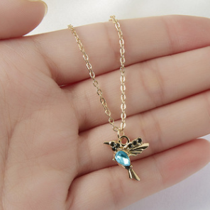 Collier et boucles d'oreilles Caméléon en or
