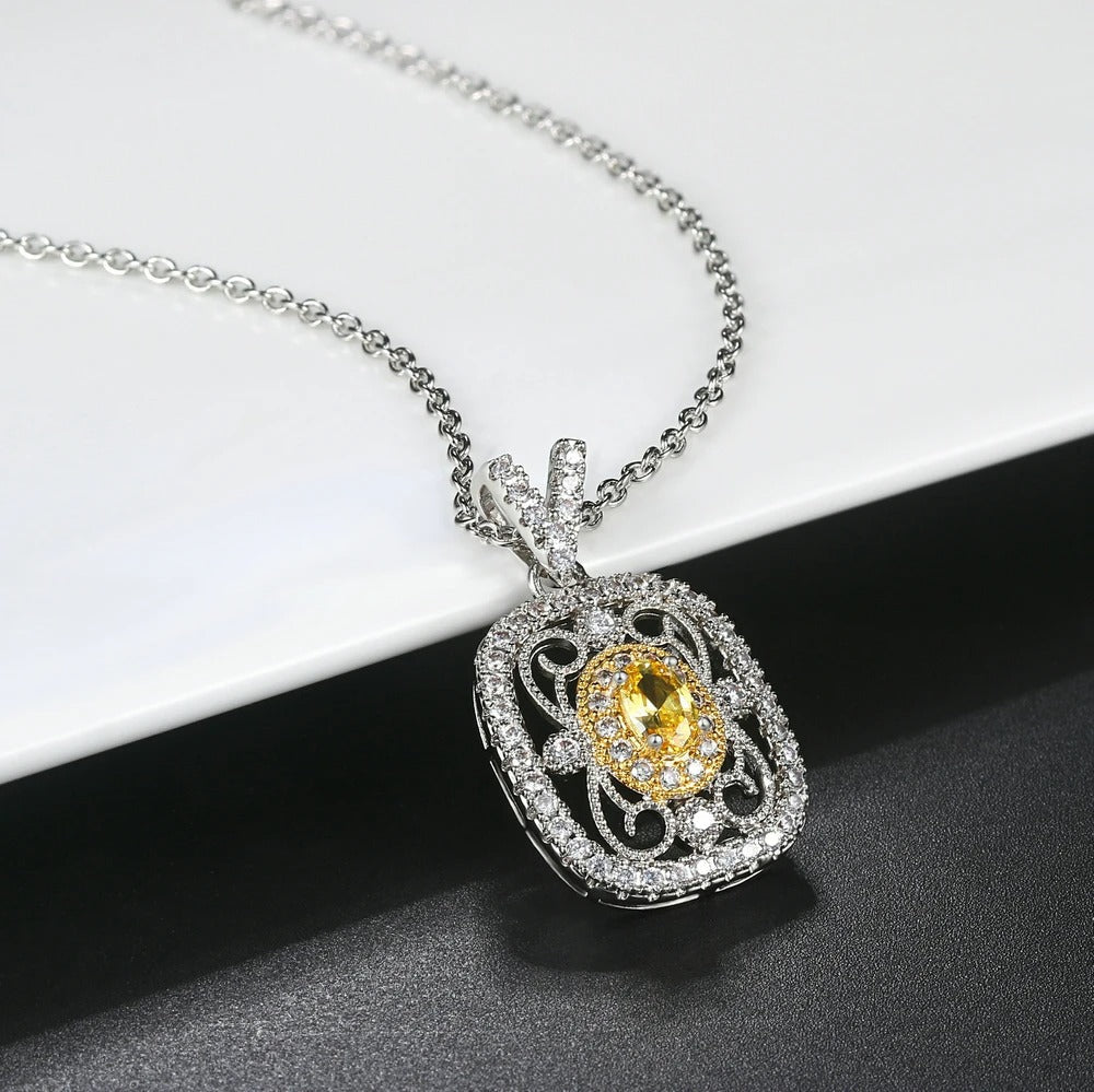 Collier rétro avec pierres précieuses jaunes et cristaux en or blanc
