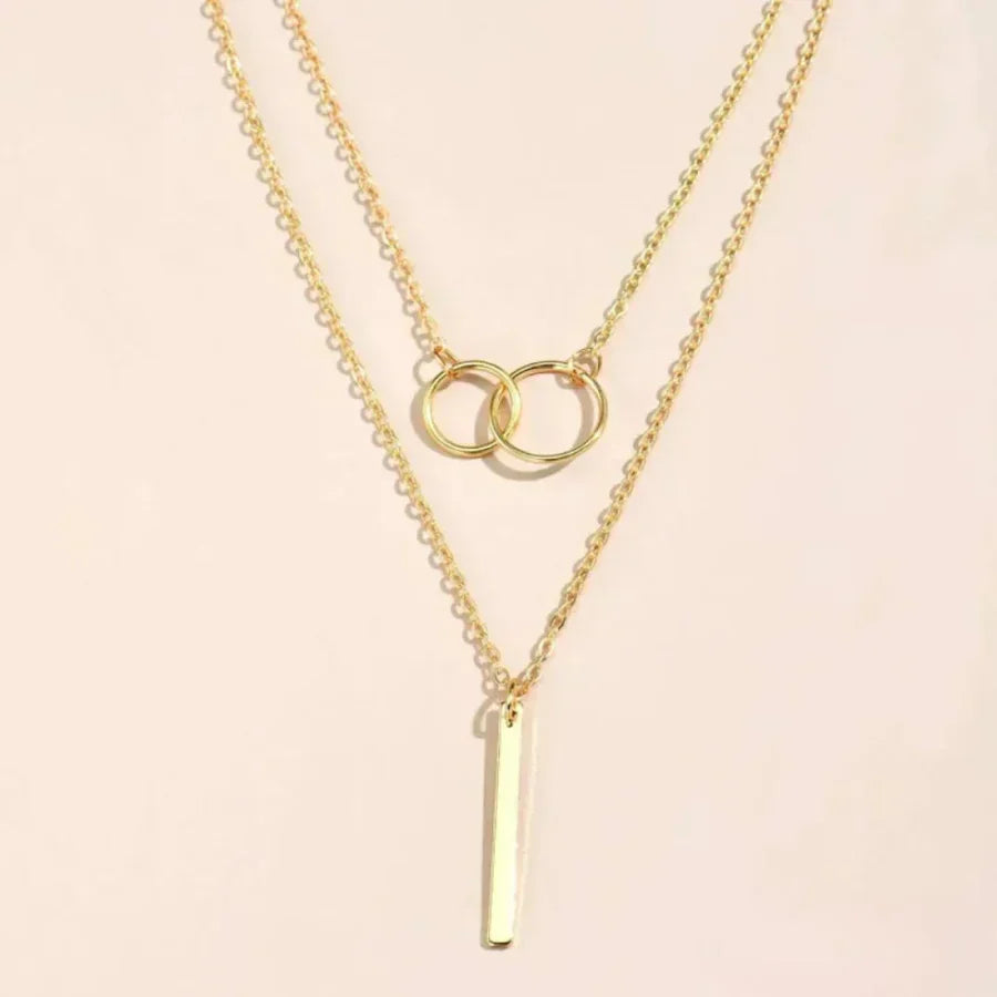 Collier rétro avec pendentif rond double en or