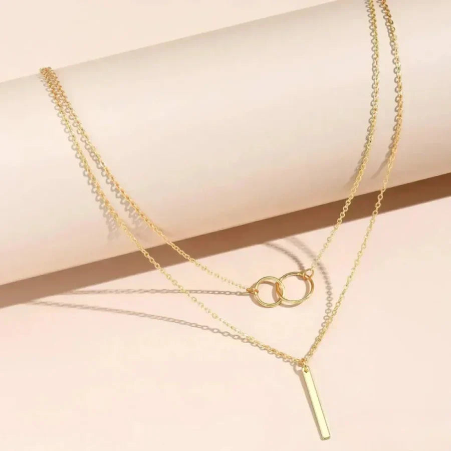 Collier rétro avec pendentif rond double en or