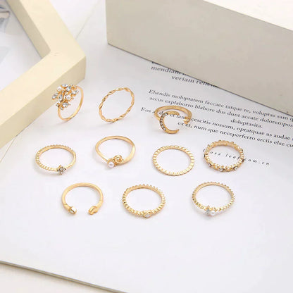 Ensemble de 10 anneaux d'assistance ornés d'argent et d'or