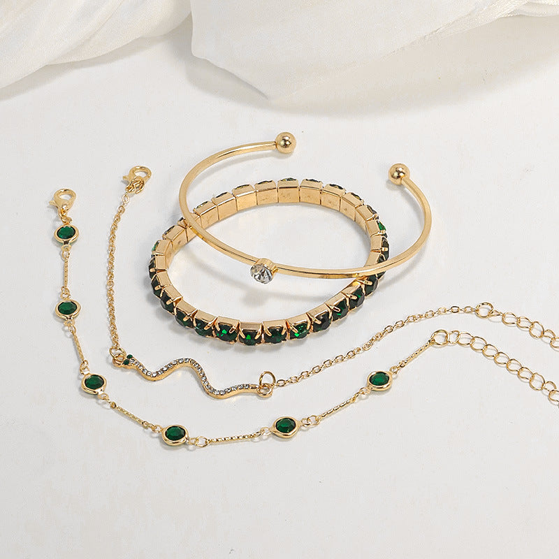 Ensemble de bracelets éclat d'émeraude en or
