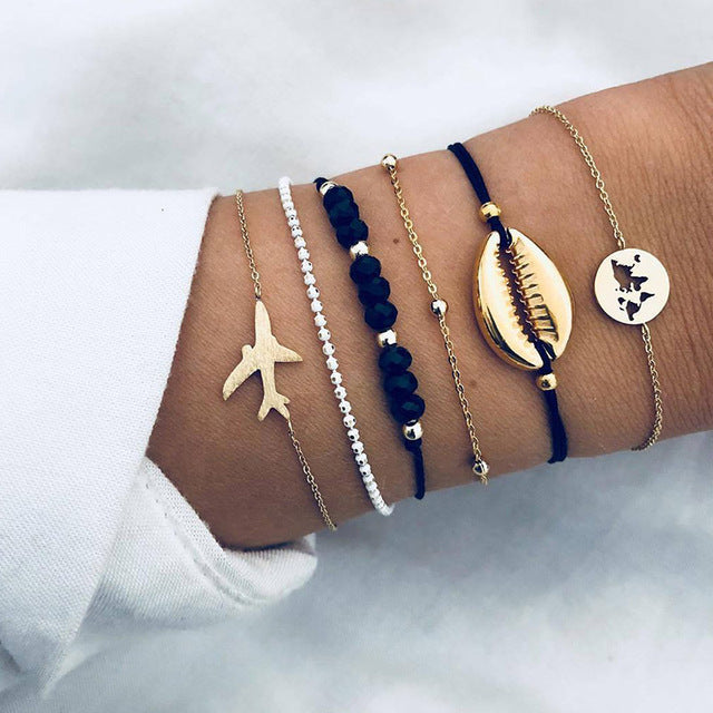 Ensemble de bracelets luxueux et scintillants en or